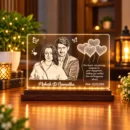 Personalized acrylic LED lamp with an engraved-style couple portrait, names and engagement message