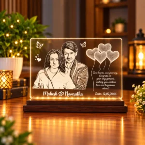 Personalized acrylic LED lamp with an engraved-style couple portrait, names and engagement message